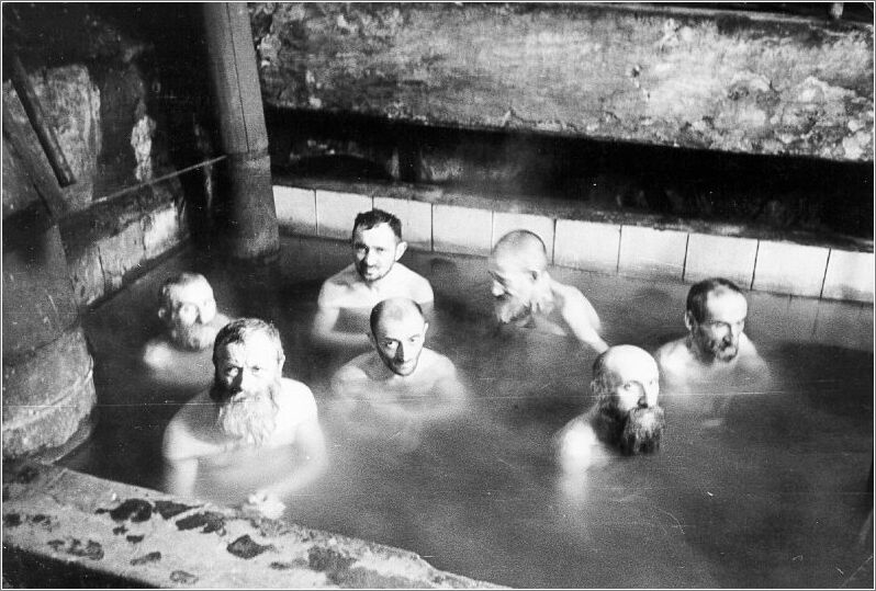 Jewish men bathing in the mikveh (ritual bath) in the Radom ghetto.